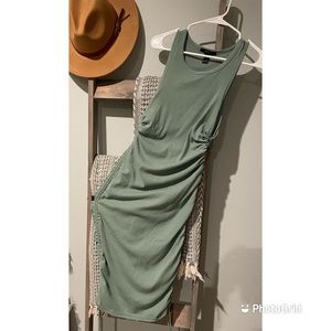 Women’s Sleeveless Dress Scrunches at side to make shorter and tighter